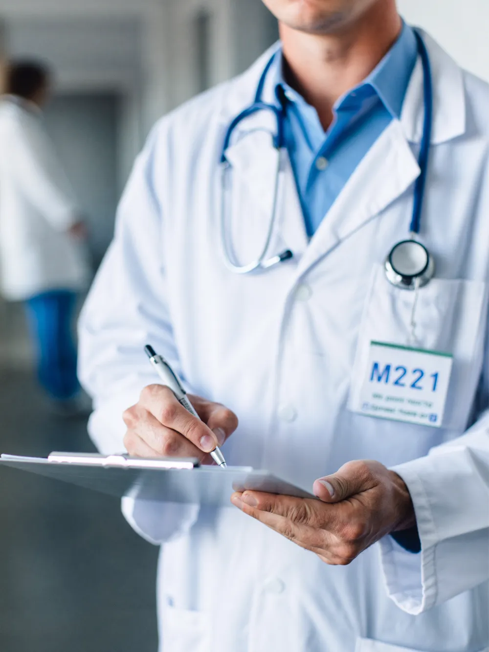 A NationWide MedCore credentialing specialist managing provider enrollment paperwork